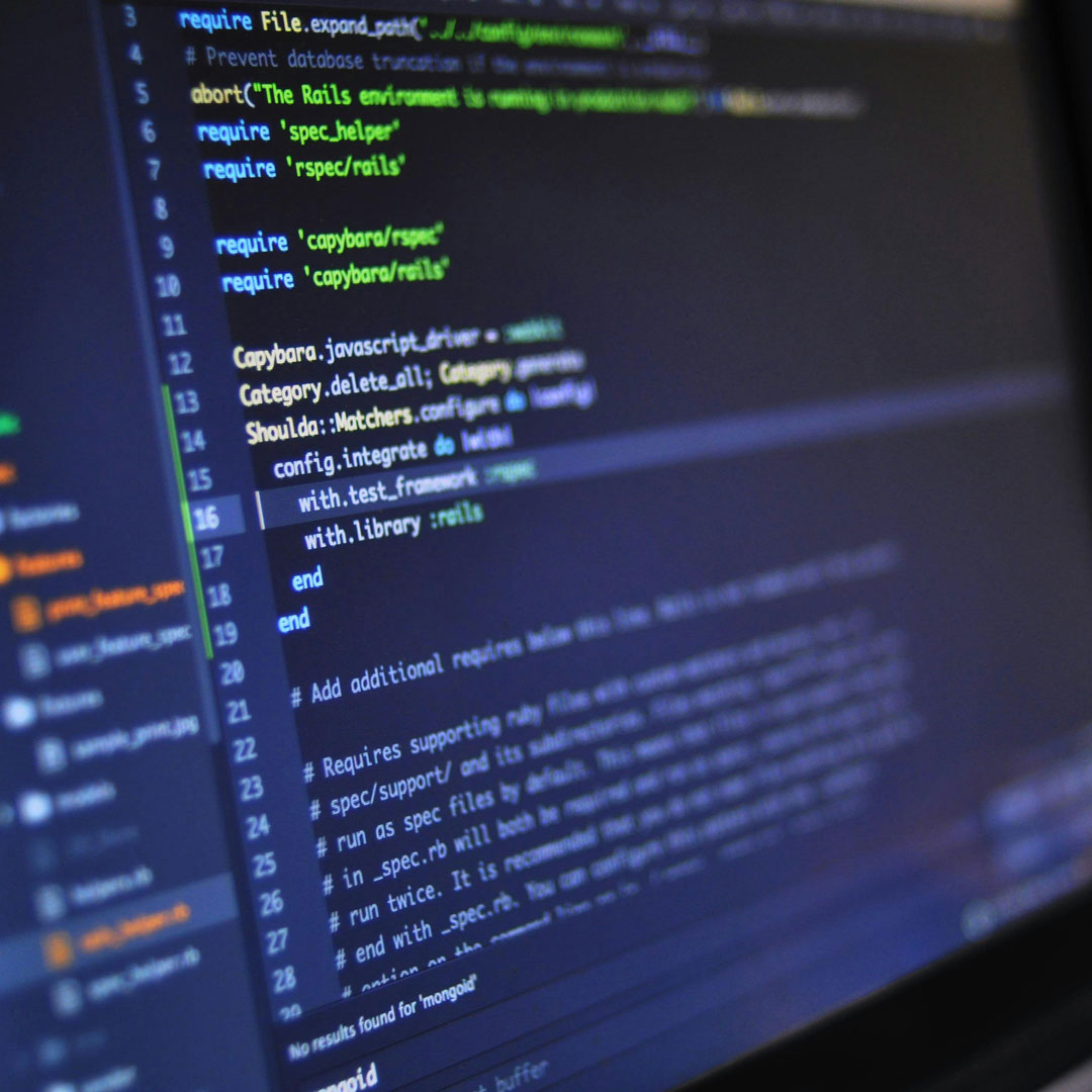 Professional UX/WebDev Services / Computer screen showing code